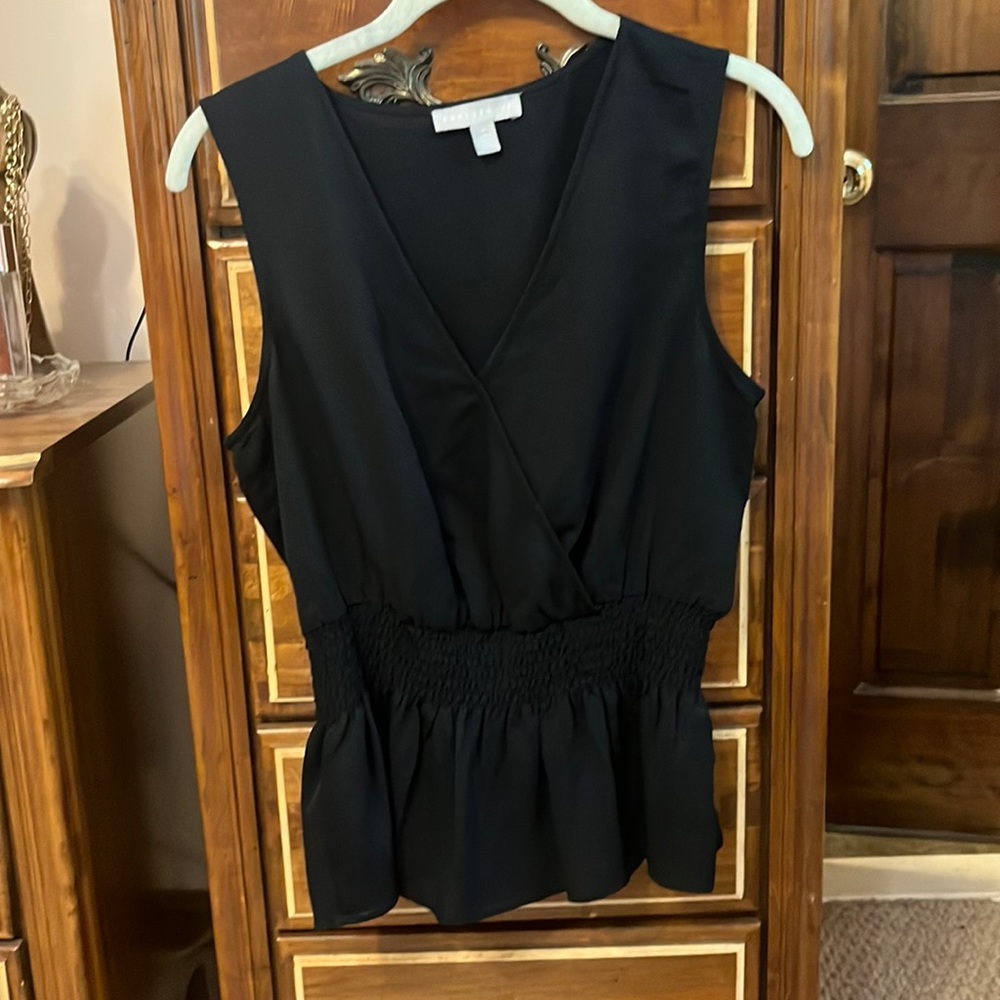 Black sleeveless top